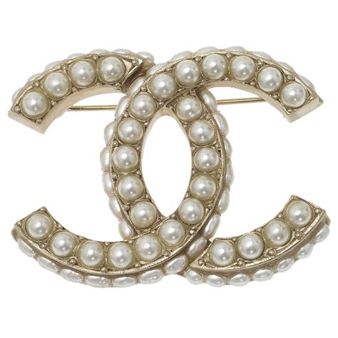 faux pearl chanel brooch